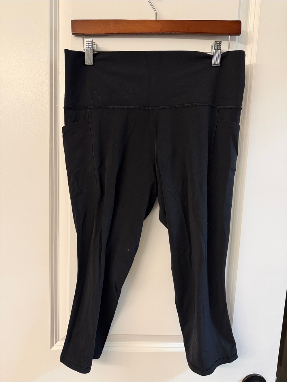 Athleta Black Capri Leggings with High Waist and Side Pockets